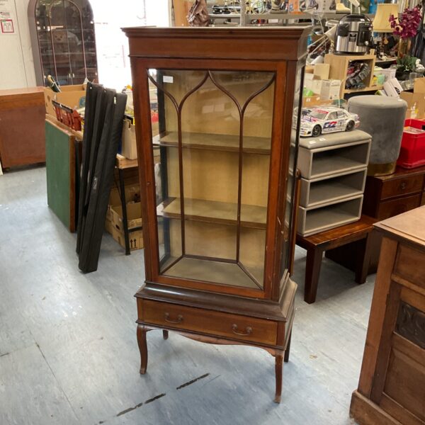 Antique early 20th-century mahogany display cabinet with glass front.