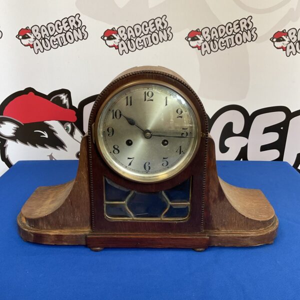 Vintage Haller drop dial mantle clock with Napoleon hat design.