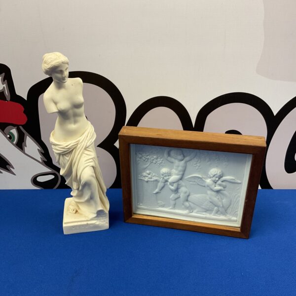 Vintage Venus sculpture and cherub tile for home decor.