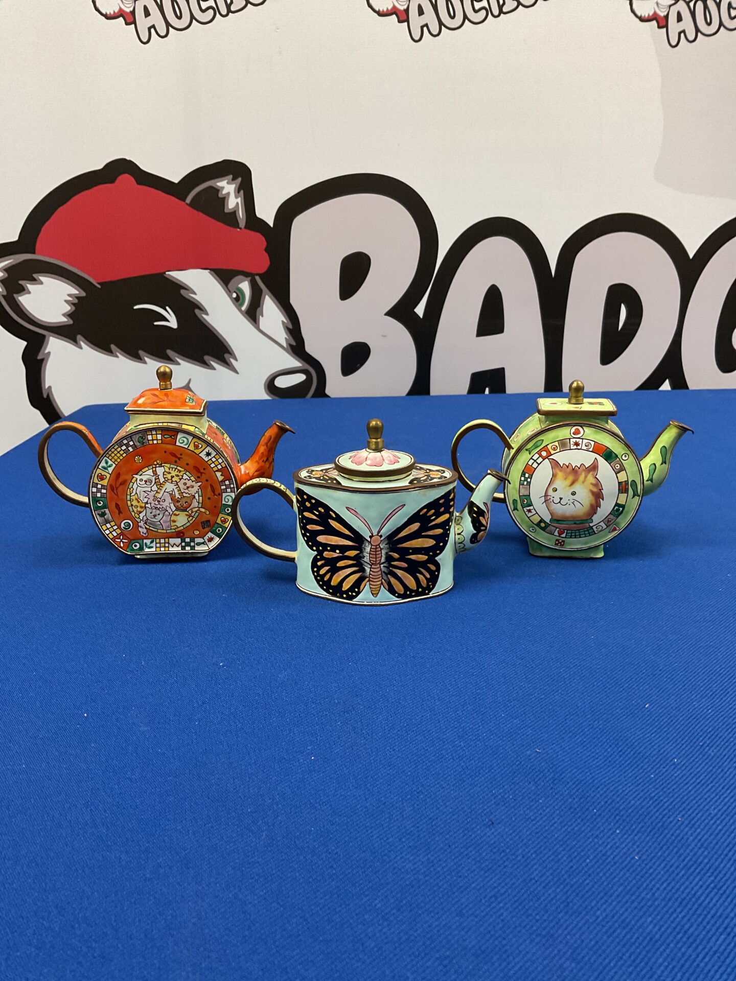 046 Three c maddicott trade aid miniature enamelled teapots