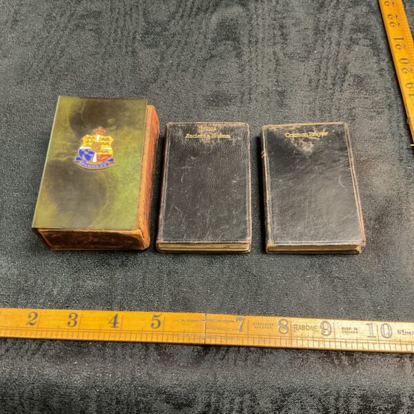 Group of antique prayer books and a Danish bronze box.