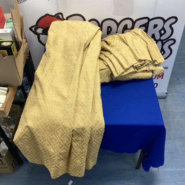 Gold pinch pleat curtains, vintage window treatments for home decor.
