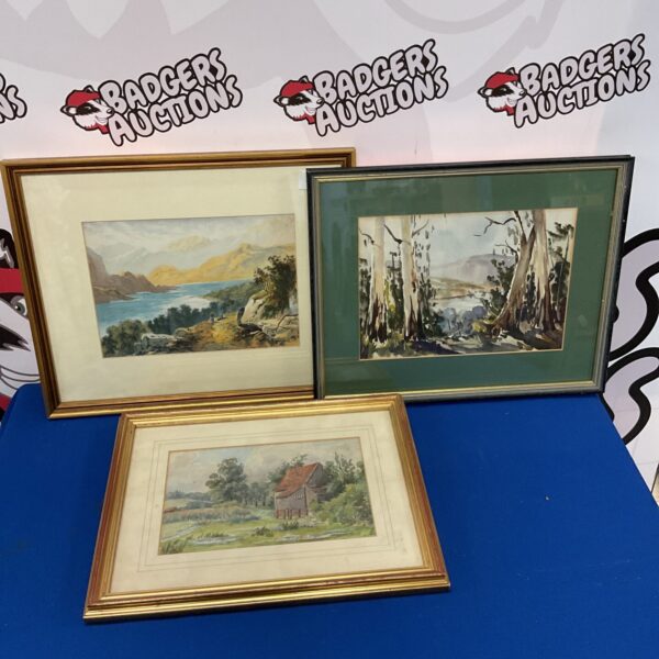 Framed watercolour landscape painting with a river and trees.