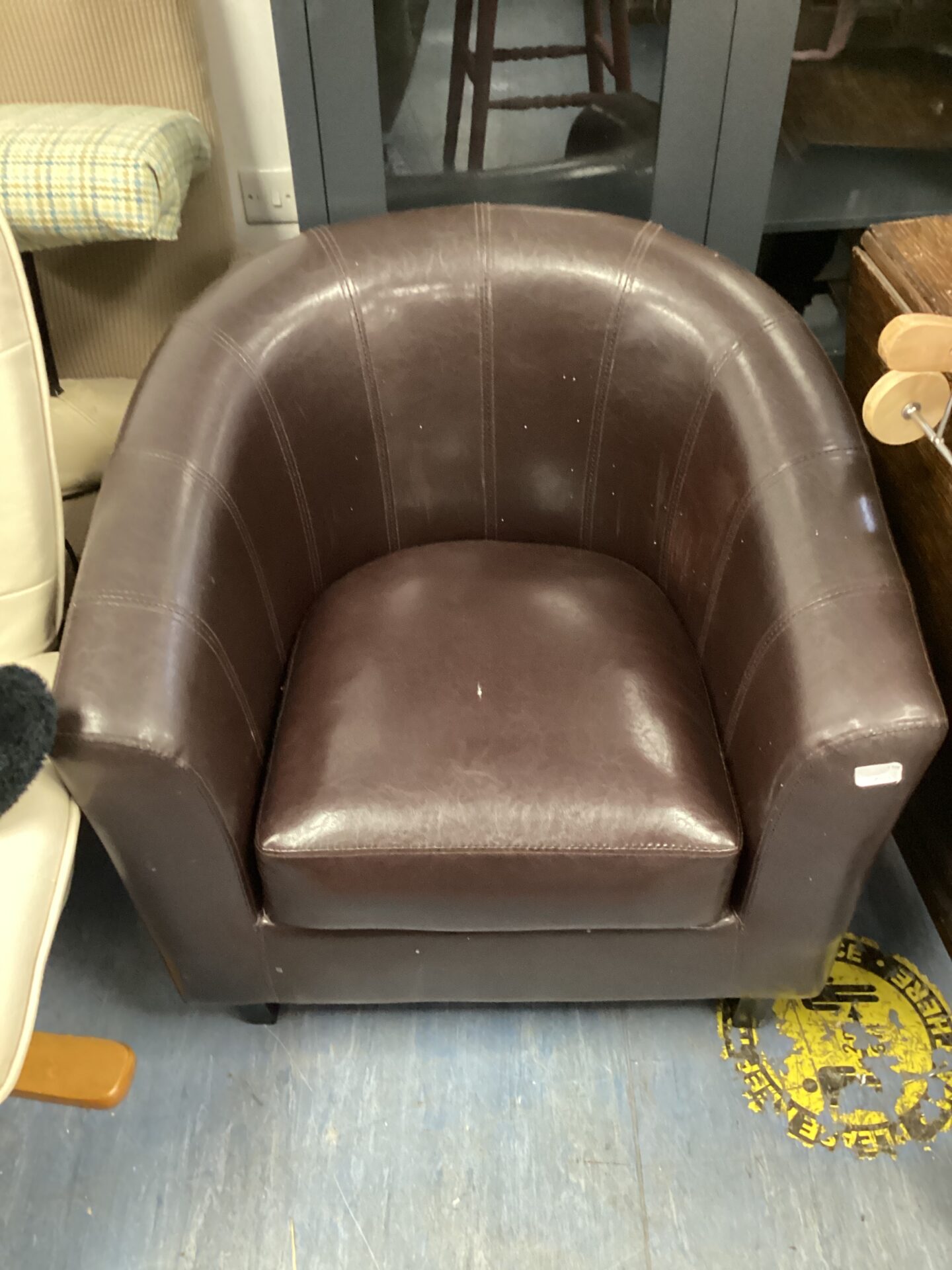 578 Brown leather tub chair