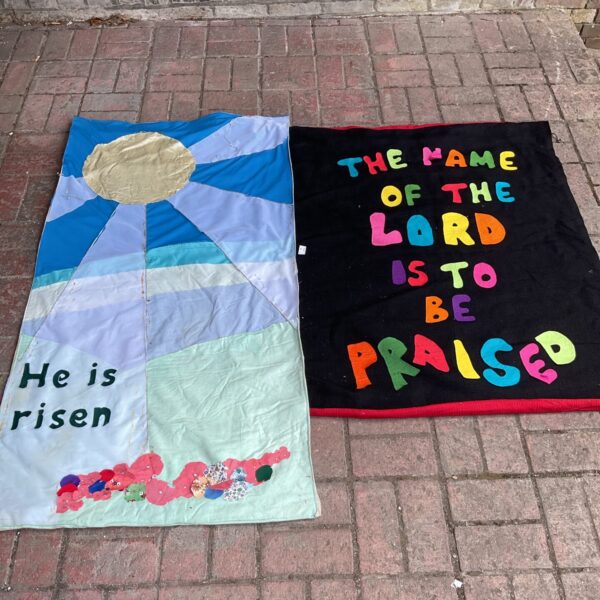 Vintage religious church banners from Chesham, featuring painted designs.