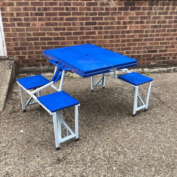 Blue LRP folding picnic table and chairs set for outdoor use.