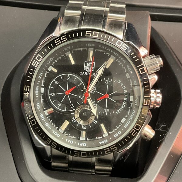 Front view of Tag Heuer Carrera reproduction watch with black dial.