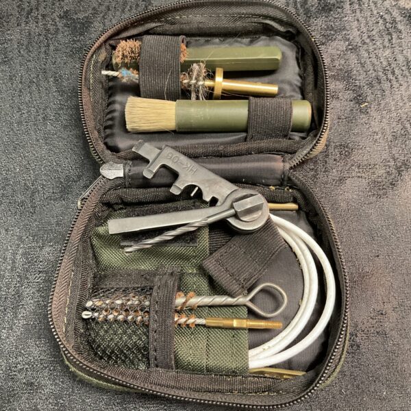 Open British Army SA80 cleaning kit with tools visible.