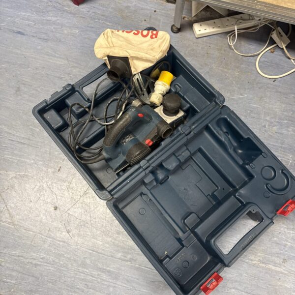 Vintage Bosch electric planer in original carrying case.
