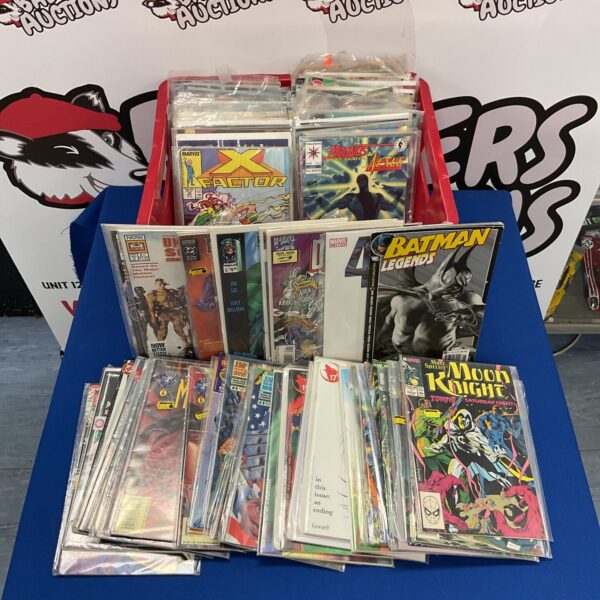 Diverse lot of vintage and modern comic books for collectors.