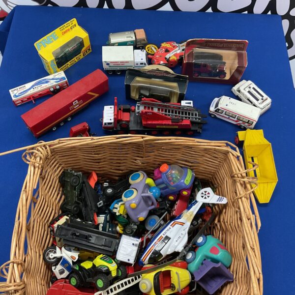 Mixed lot of diecast vehicles and toy cars for collectors.