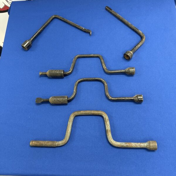 Lot of five vintage wheel nut braces for classic car restoration.