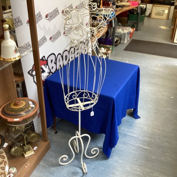 Close-up of vintage wire dress form mannequin.