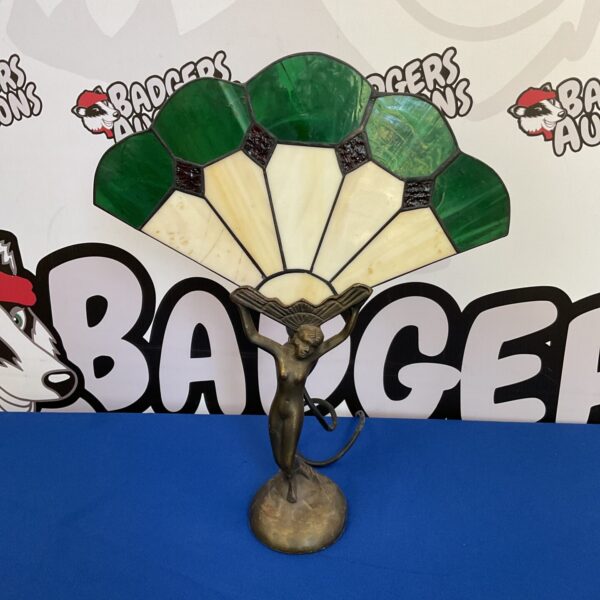 Vintage art deco table lamp with a sculpted lady figure.