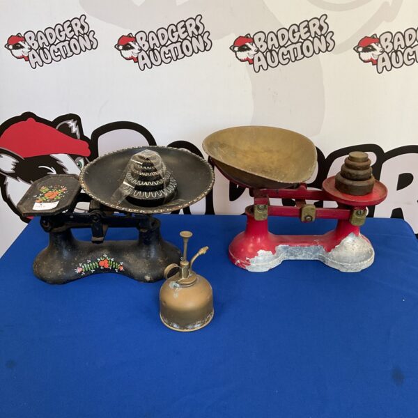 Vintage balance scales with brass plant sprayer, antique weighing equipment.