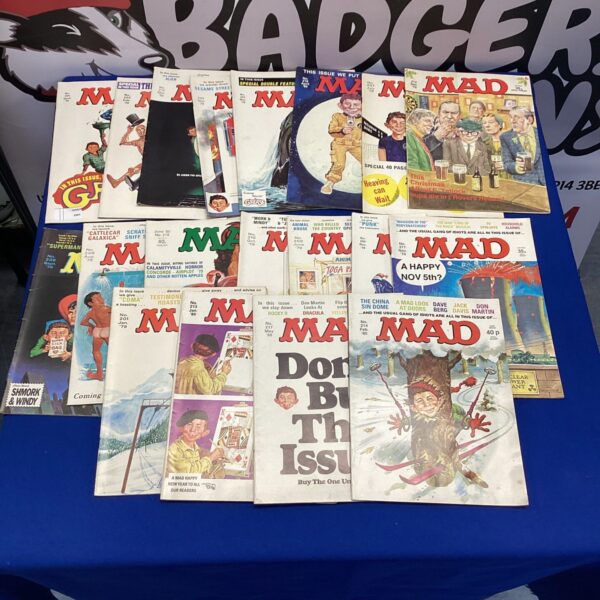 Lot of vintage MAD comics, showcasing classic satirical magazine covers.