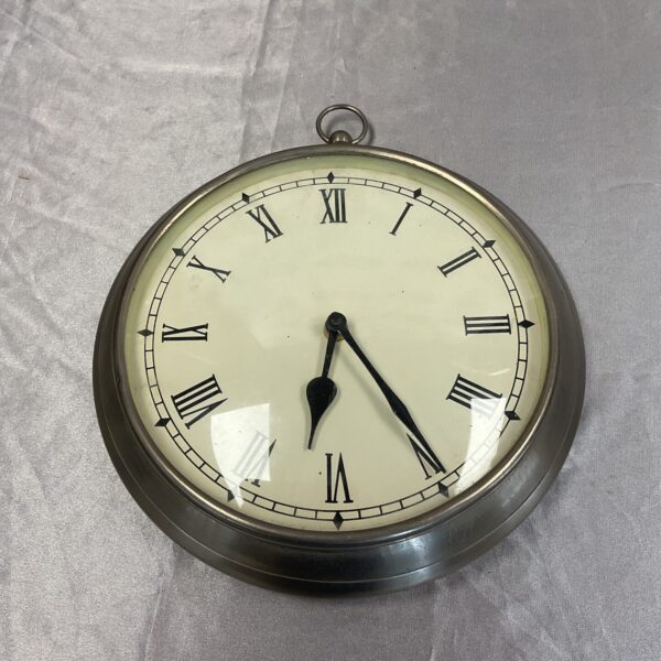 Large quartz pocket watch wall clock with Roman numerals.