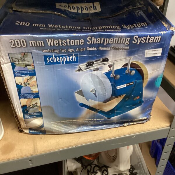 Scheppach wetstone sharpening system with jigs and compound.
