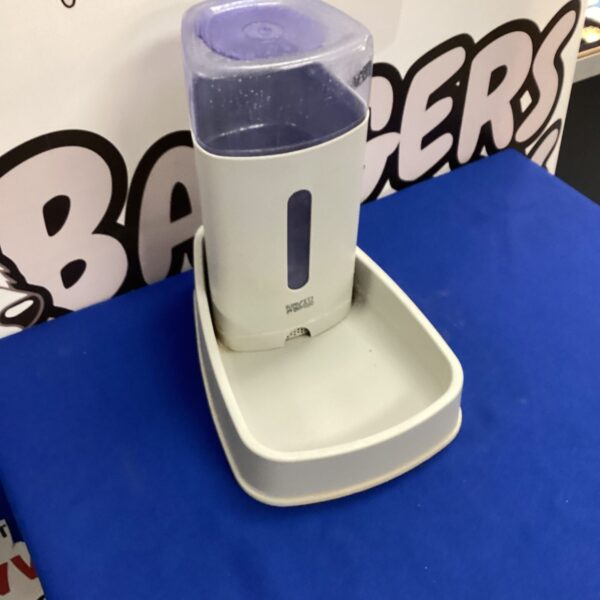 Blue pet water station for cats and dogs.
