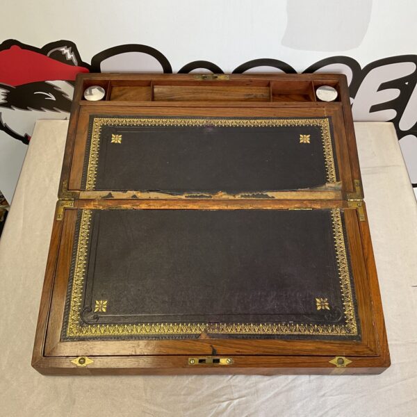 Closed antique Victorian writing slope with brass banding.