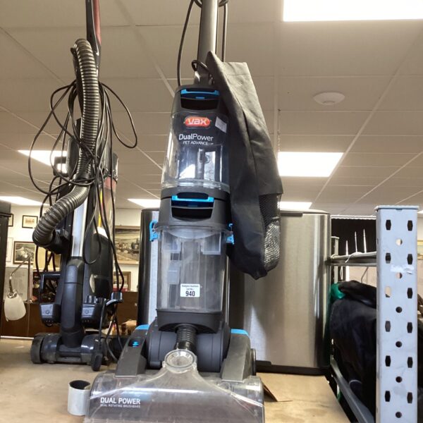 Vax Dual Power vacuum cleaner with hose and attachments.