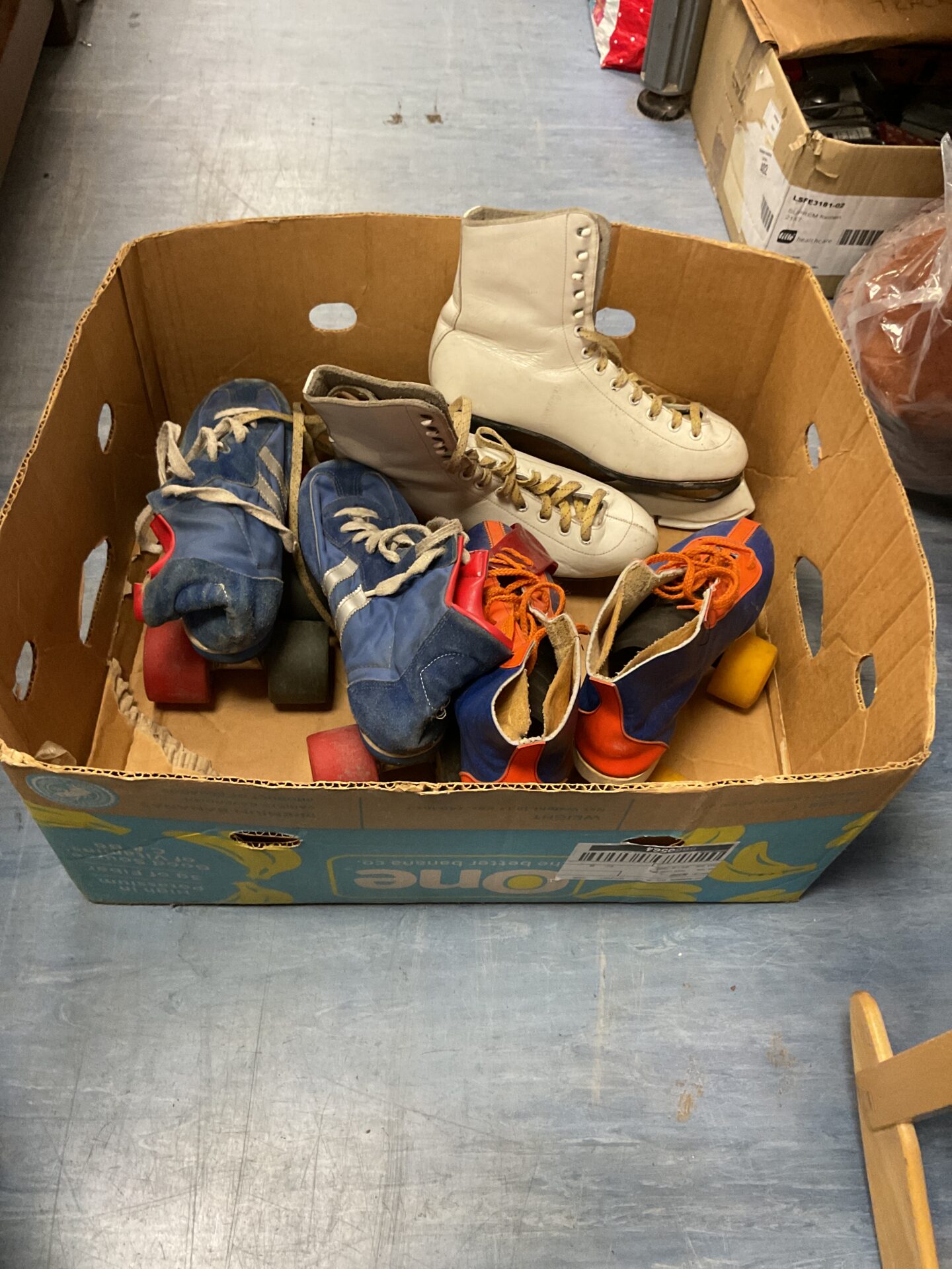 432 Box of vintage ice and roller skates