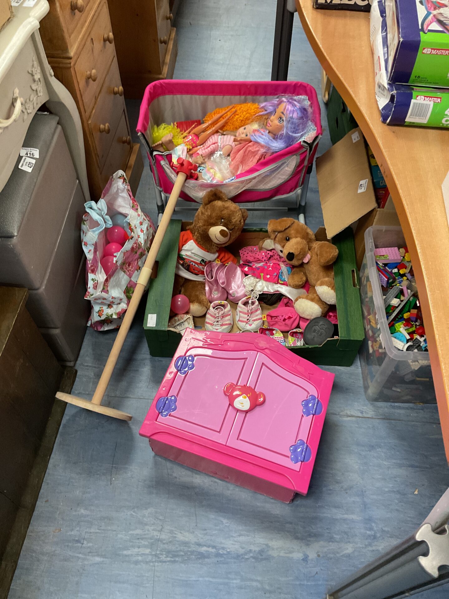 409 Crate and dolls crib full of children’s toys and dolls inc barbie and soft teddies