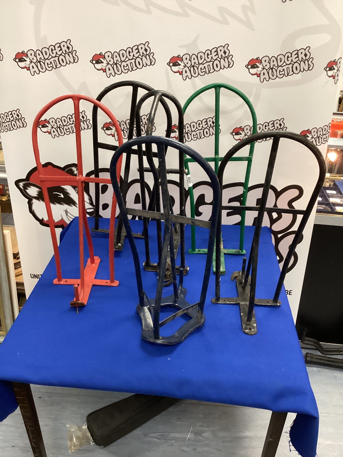 1002 Six metal wall hanging Saddle Rests