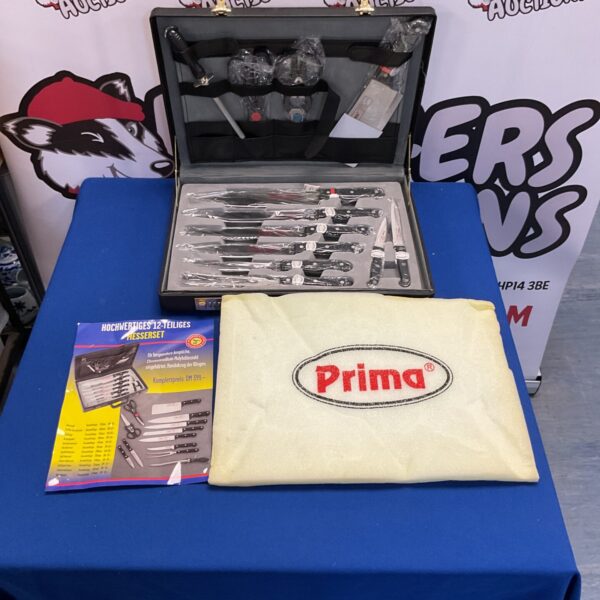 Vintage Prima 12-piece kitchen set in original case.