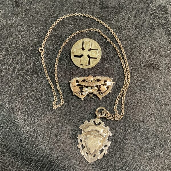 Antique Victorian Mizpah sweetheart brooch with silver chain and fob.
