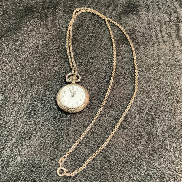 Vintage rotary watch pendant on a 925 silver necklace.