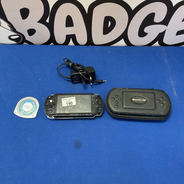 Sony PSP-3000 handheld console with case and charger.
