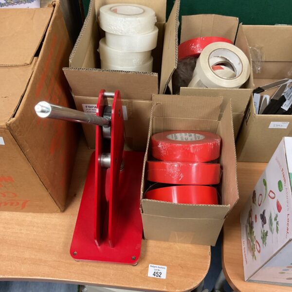 Red Sign Geek Eye Pro2 tape dispenser with reinforcing tape rolls.