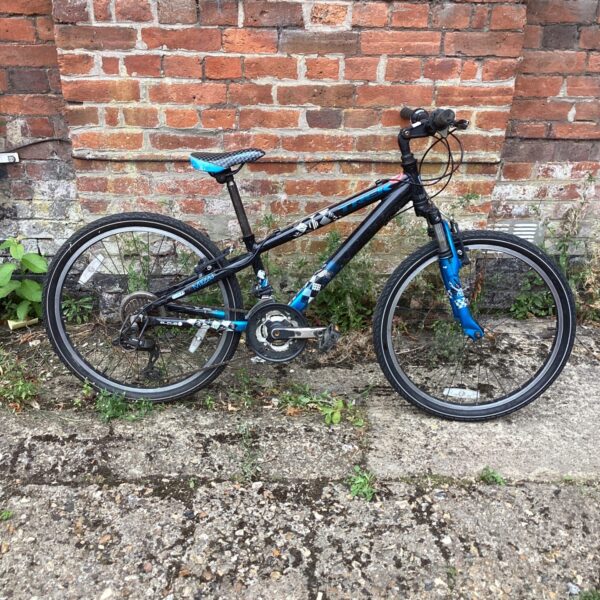Black and blue Trek MT200 cross bike for sale.
