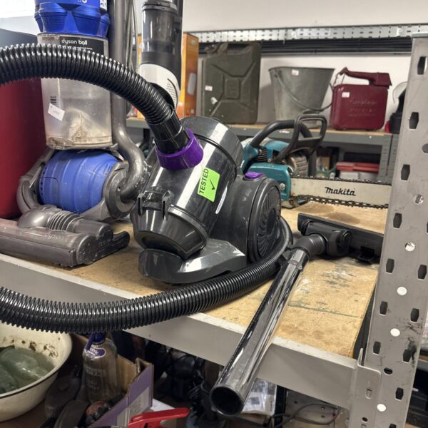 Blue Bergstrom Stowaway Hoover vintage canister vacuum cleaner.