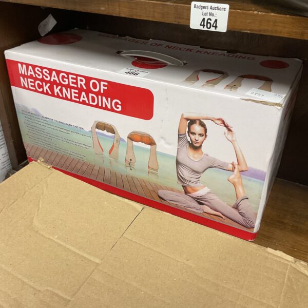 Vintage boxed neck massager for relaxation and shoulder relief.