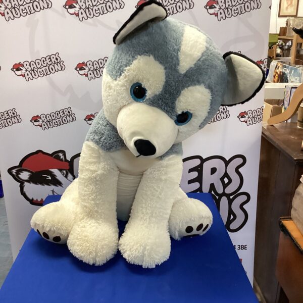 Large husky dog plush toy, soft and cuddly.