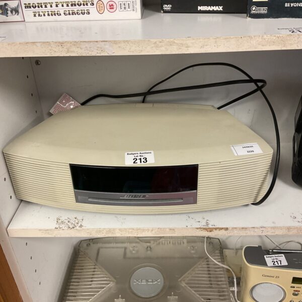 Vintage Bose Wave music system with CD player and radio.