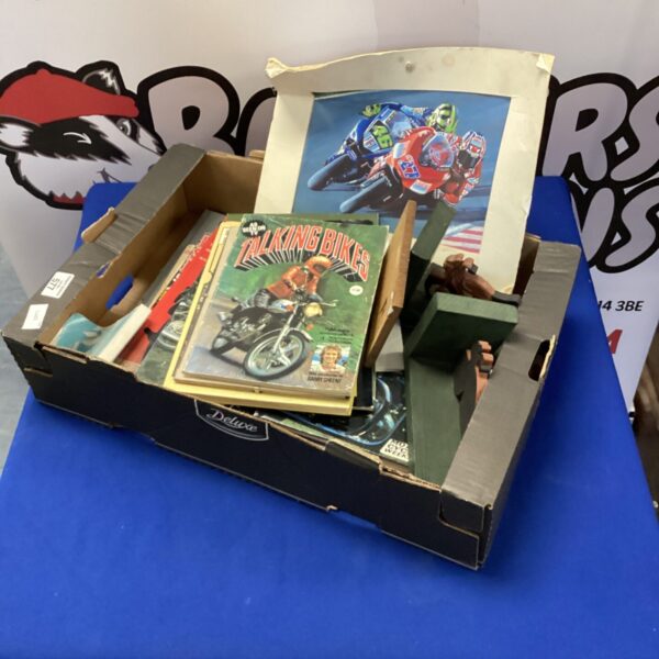 Vintage lot of motorcycle magazines, books, and ephemera for collectors.