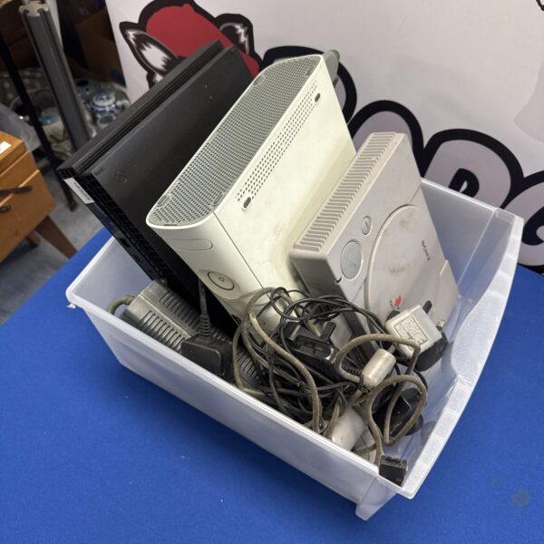 Gaming console bundle including Xbox One X, Xbox 360, and PlayStation.