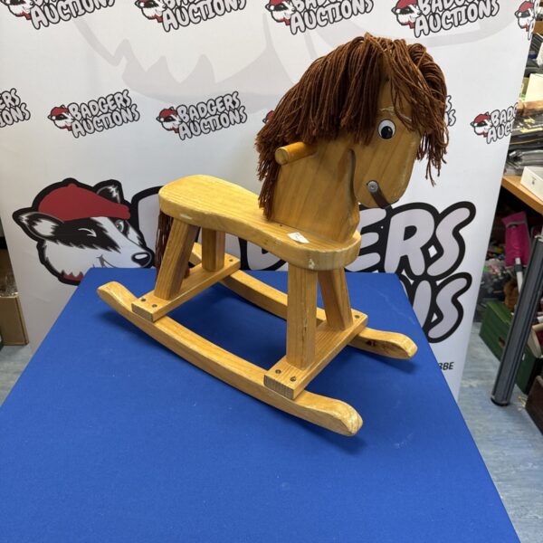Vintage wooden rocking horse, classic childhood toy