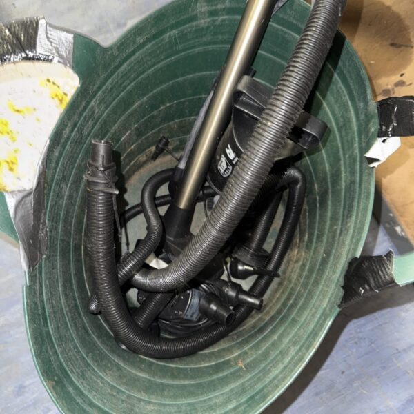 Air pump components in a bucket, including tubing and air stone.