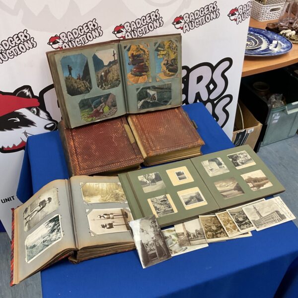 Vintage photo albums and antique postcards, a collectible history.