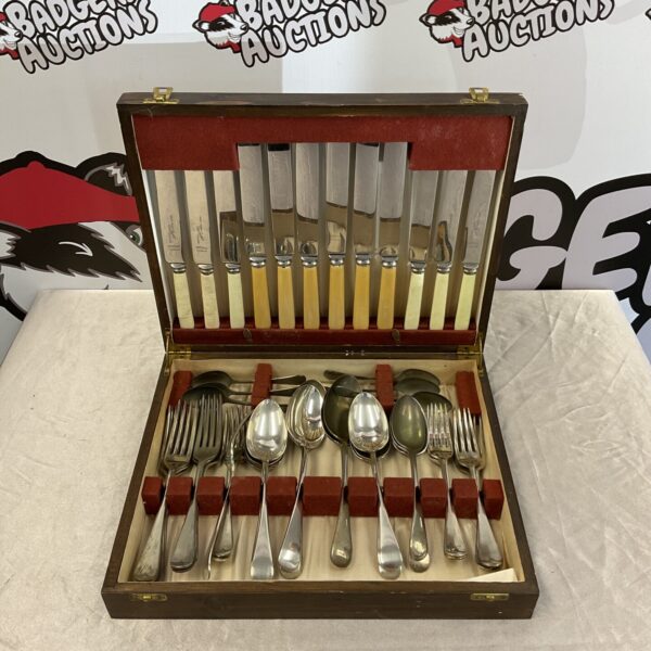 Vintage James Walker Century cutlery set with bone handles.