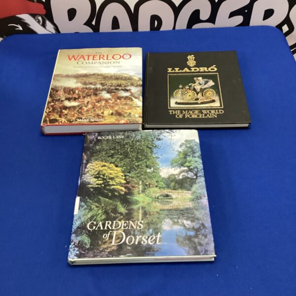 Book lot featuring The Waterloo Companion, Gardens of Dorset and Lladro.