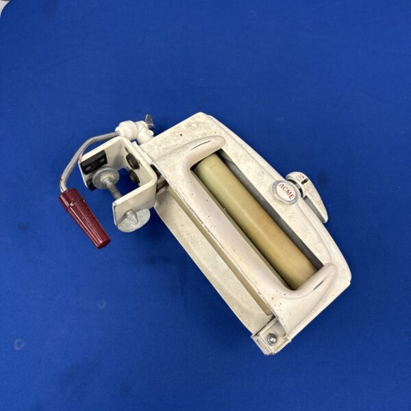 Vintage table clamp washing mangle for laundry, antique domestic tool.