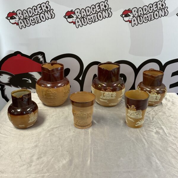 Set of six antique Victorian Royal Doulton jugs and beakers.