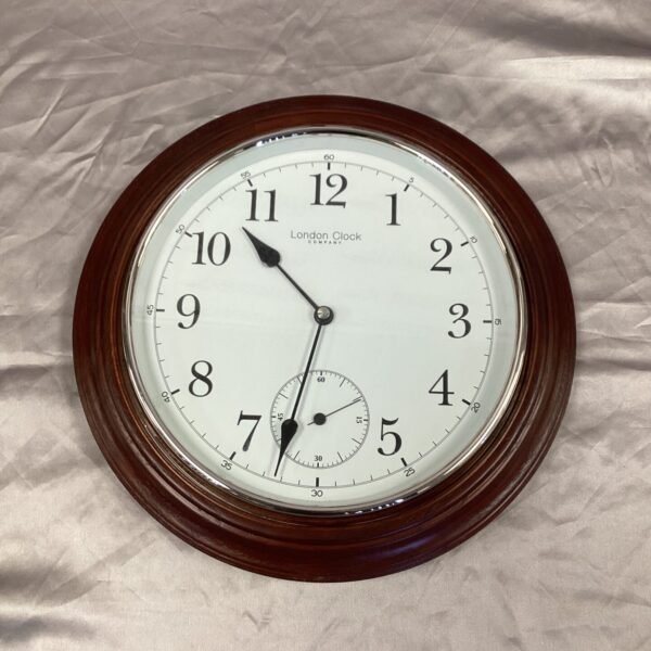 Vintage London Clock Company quartz wall clock for home decor.