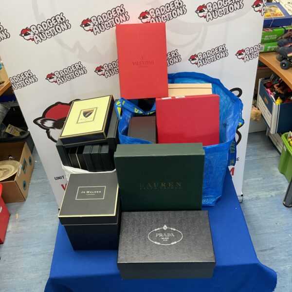 Luxury designer box lot featuring Prada, Valentino, and Ralph Lauren branding.