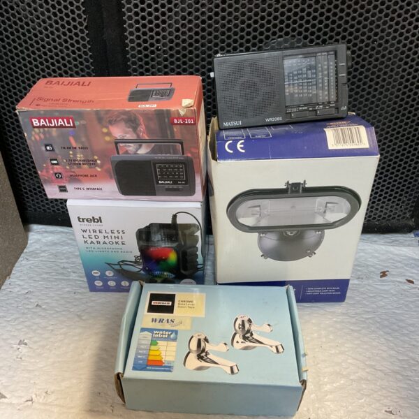 Portable radio lot including Trebl karaoke machine and floodlight.